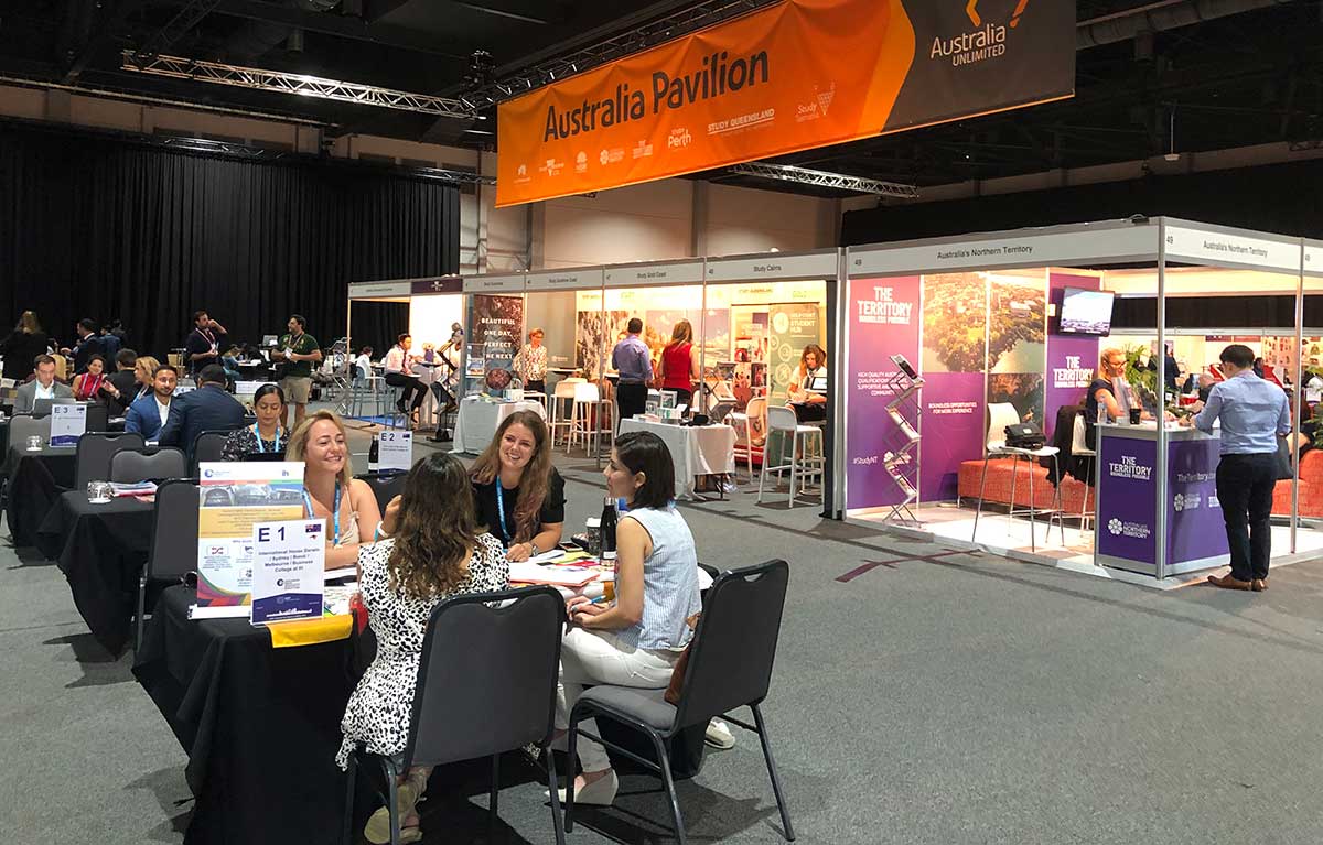 Attendees and exhibition stands at the ICEF workshop