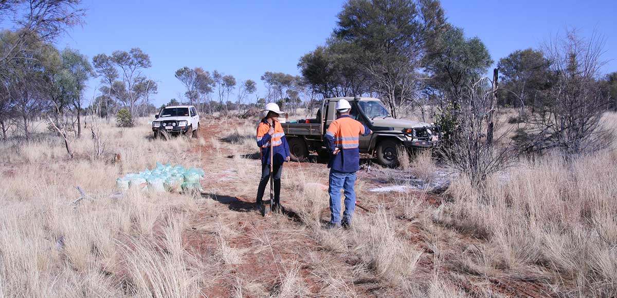 Workmen and trucks in remote Northern Territory