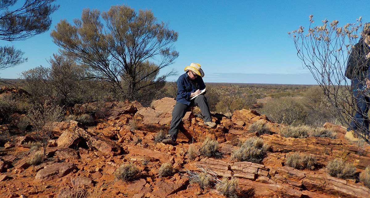 Man sitting on rocks in remote Northern Territory