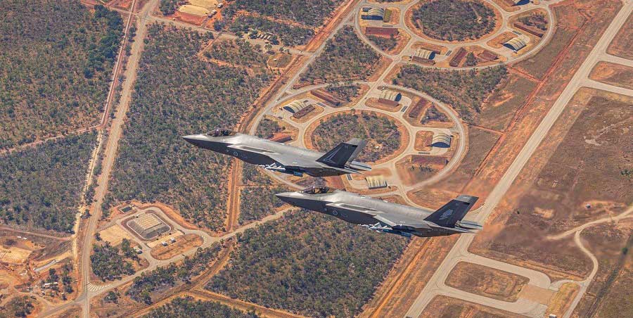 Two military planes in flight