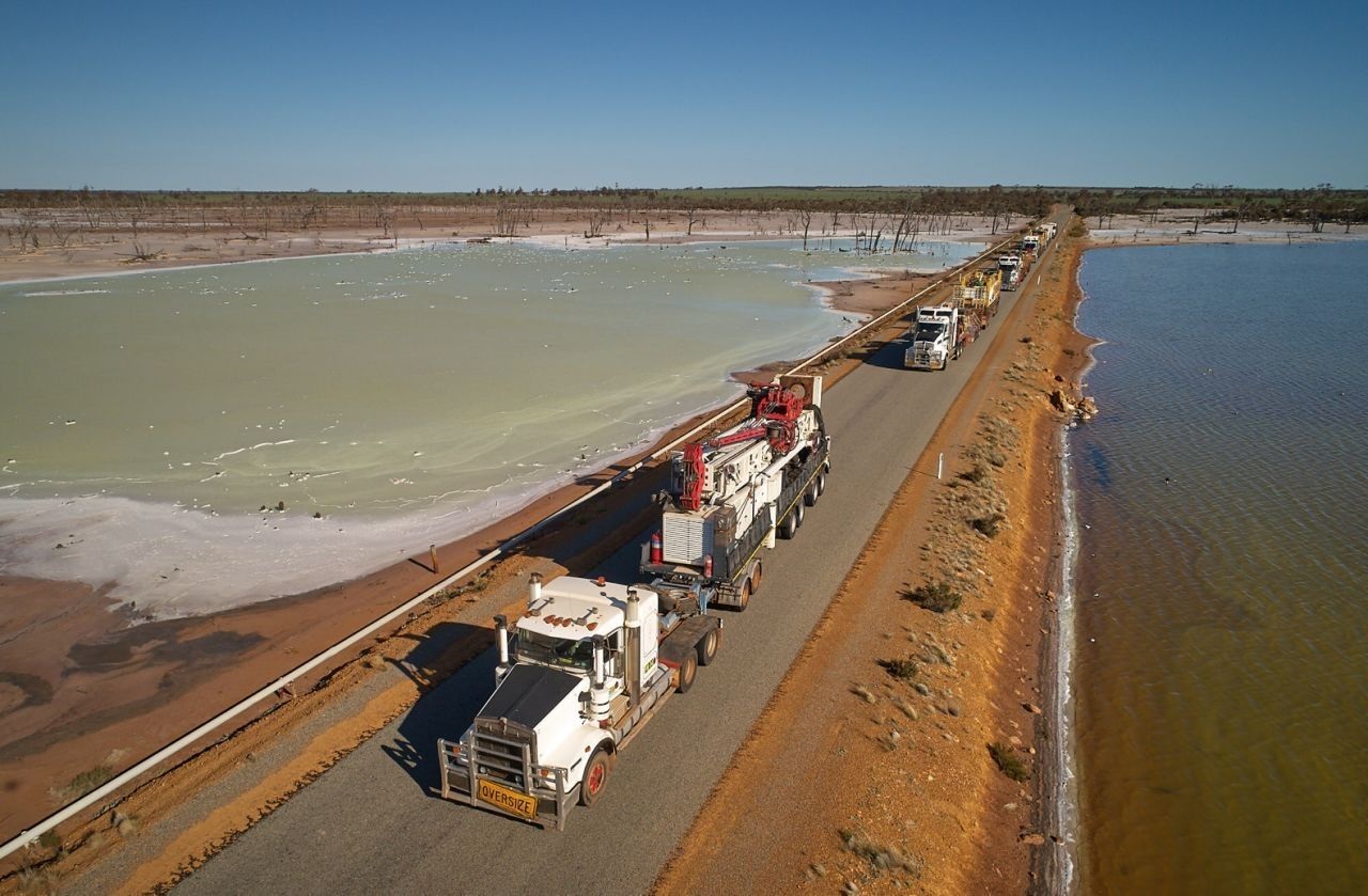 Drilling equipment being supped by large road trains