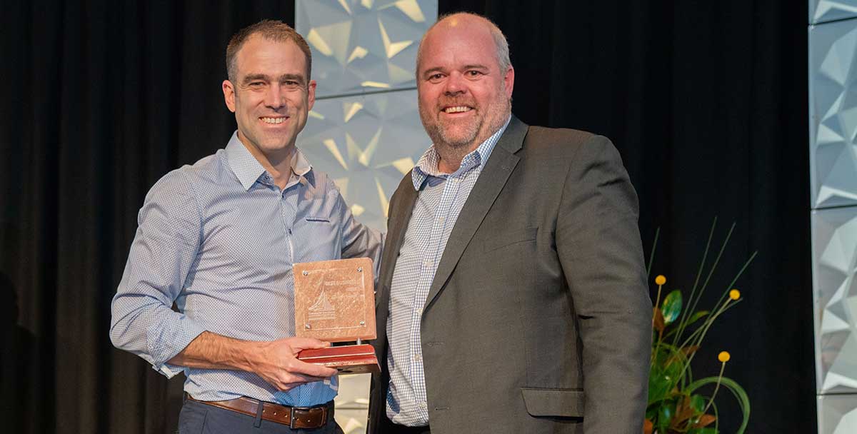 Trusty Glass Managing Director, Christopher Hatzimihail, receiving the Alice Springs Customer Service Award