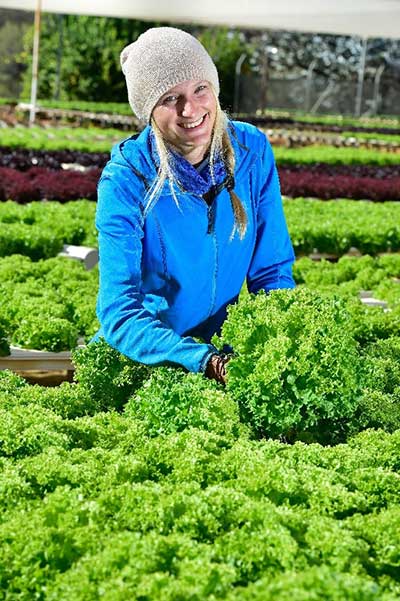 Young woman working in a nursery