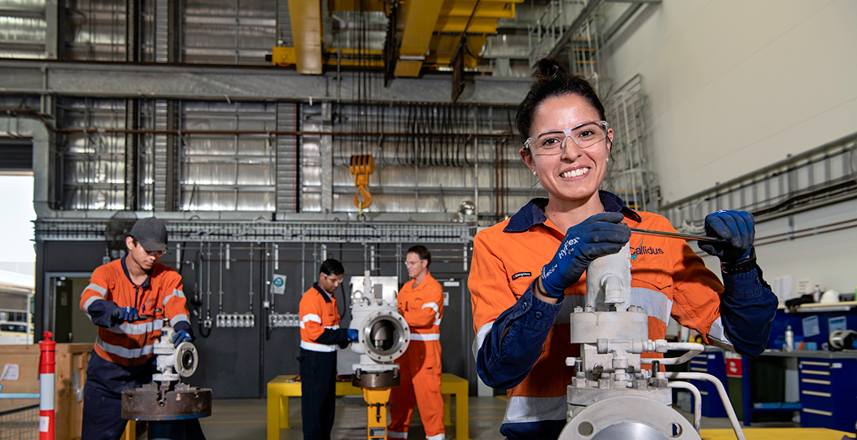 Workers maintaining offshore equipment