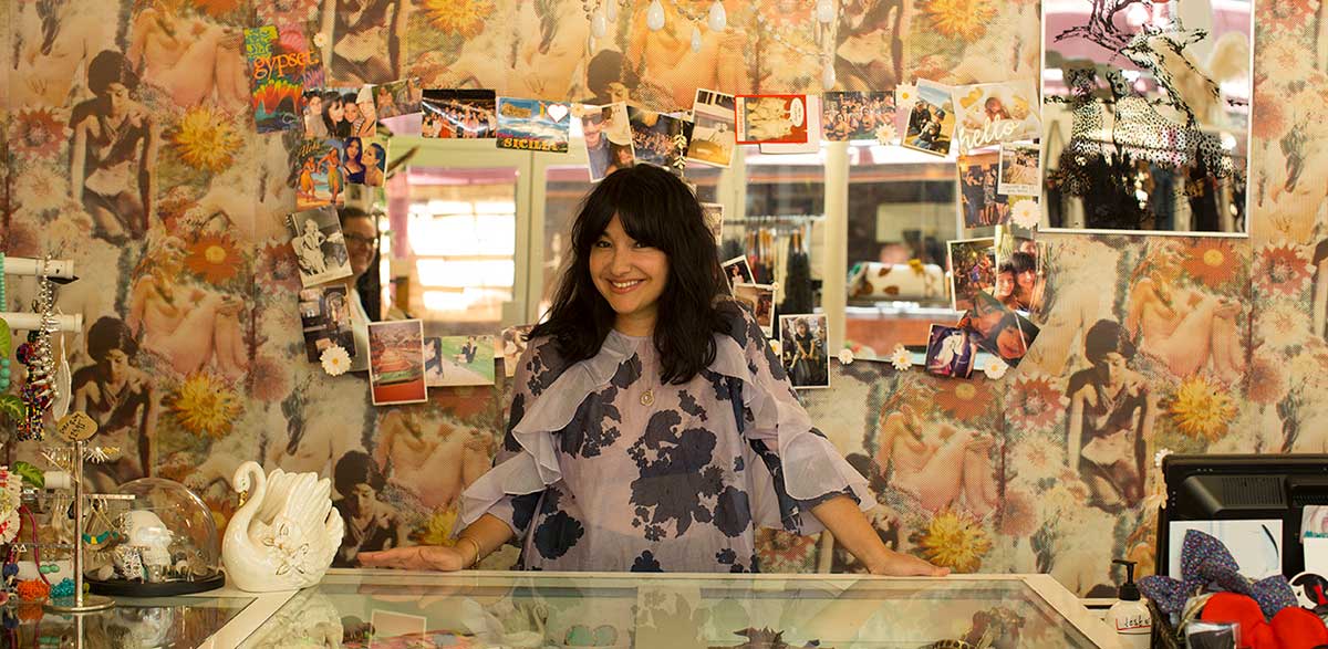 Businesswoman standing at counter