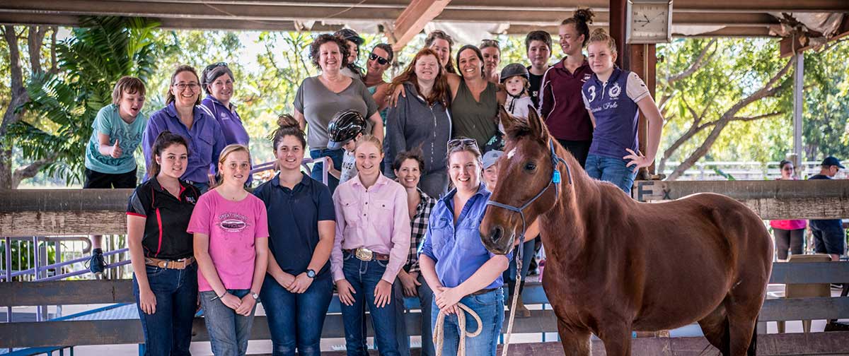 Riding for the Disabled employees and clients with a horse