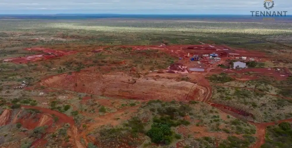 Aerial view of a large open‑pit mine in a remote landscape.