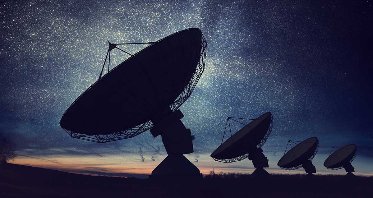 Satellite dishes against the starry sky