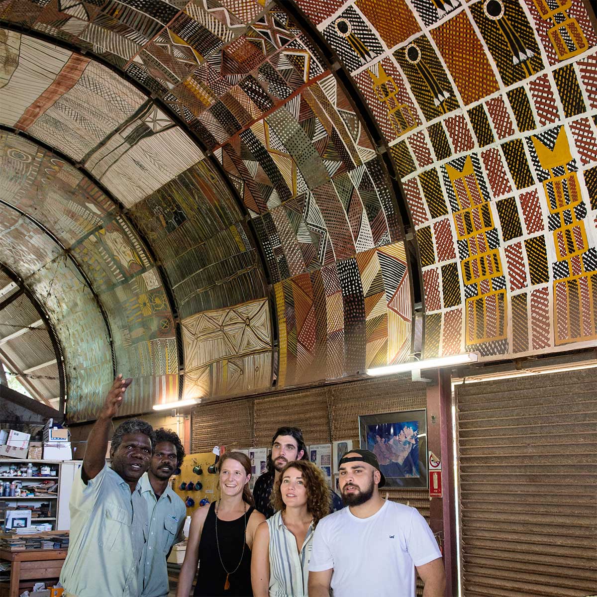 Tourists viewing Aboriginal artwork